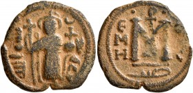 ISLAMIC, Umayyad Caliphate. temp. Mu'awiya I ibn Abi Sufyan , AH 41-60 / AD 661-680. Fals (Bronze, 20 mm, 3.42 g, 12 h), Arab-Byzantine type, Hims. Im...