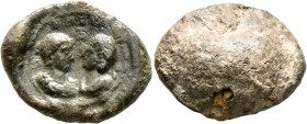 SEALS, Roman. Seal (Lead, 21 mm, 6.53 g), circa 3rd-4th century AD. Draped male bust, on the left, facing a draped female bust, on the right; above, i...