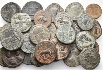 A lot containing 31 bronze coins. Includes: Roman Provincial, Roman Imperial, Byzantine and early Medieval coins. About very fine to very fine. LOT SO...