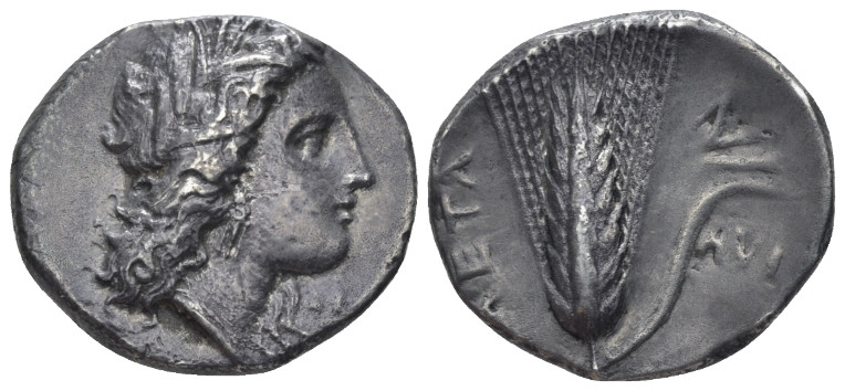 Lucania, Metapontum Nomos circa 330-290, Æ 19.00 mm., 6.90 g.
Head of Demeter r...