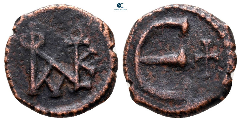 Justin II AD 565-578. Antioch
Pentanummium Æ

15 mm, 1,60 g



very fine...