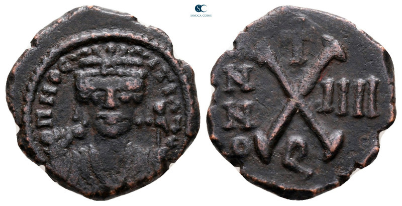 Tiberius II Constantine AD 578-582. Theoupolis (Antioch)
Decanummium Æ

17 mm...