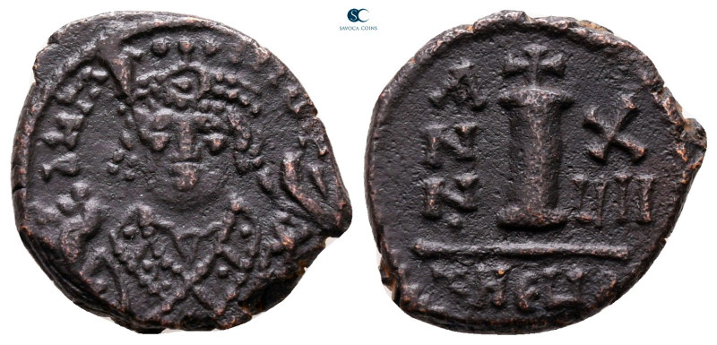 Maurice Tiberius AD 582-602. Theoupolis (Antioch)
Decanummium Æ

17 mm, 2,67 ...