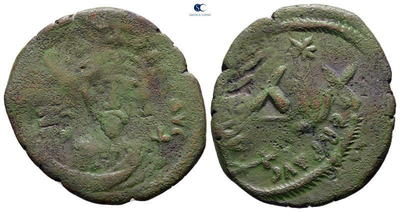 Phocas AD 602-610. Constantinople
Half Follis or 20 Nummi Æ

26 mm, 4,96 g
...