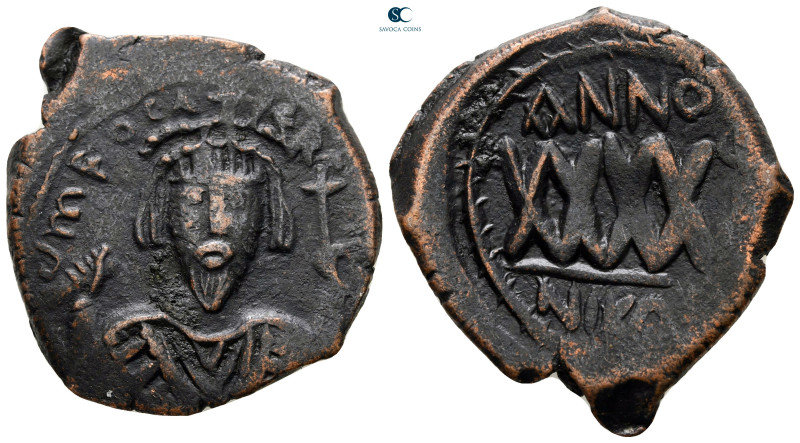 Phocas AD 602-610. Nikomedia
Follis or 40 Nummi Æ

33 mm, 13,40 g



very...