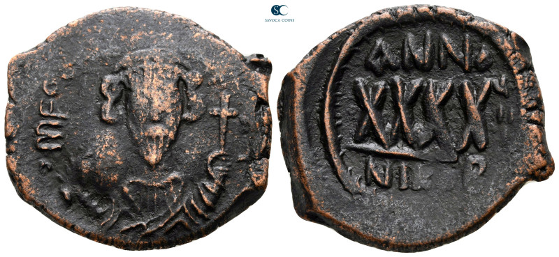 Phocas AD 602-610. Nikomedia
Follis or 40 Nummi Æ

30 mm, 12,41 g



near...