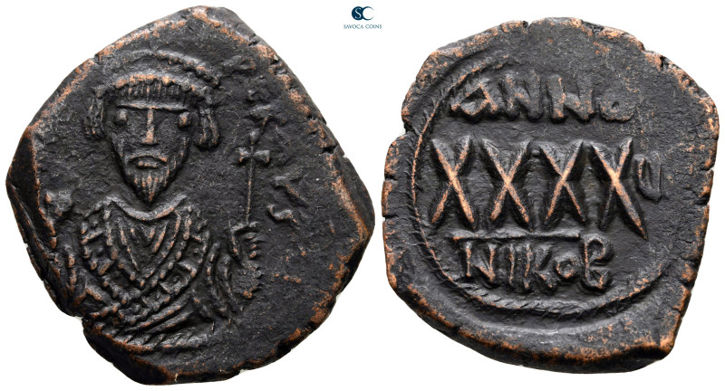 Phocas AD 602-610. Nikomedia
Follis or 40 Nummi Æ

32 mm, 11,60 g



very...