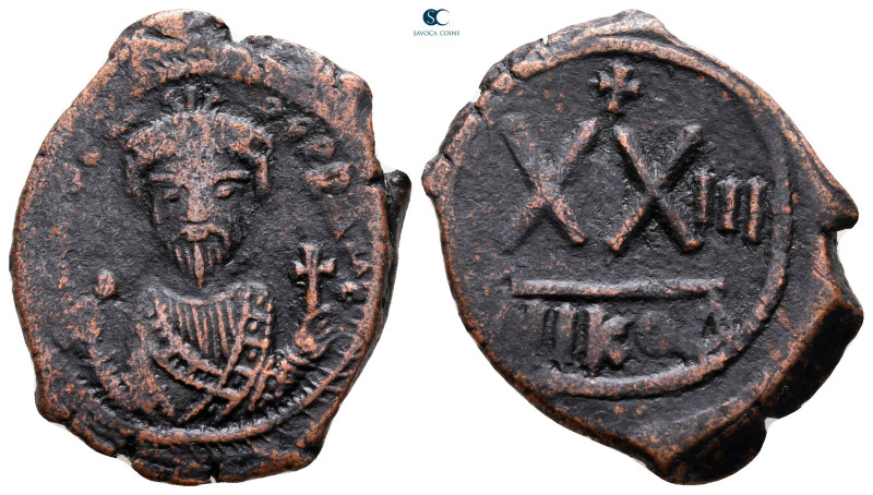 Phocas AD 602-610. Nikomedia
Half Follis or 20 Nummi Æ

26 mm, 5,75 g



...