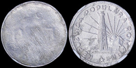 ROMANIA: 1 Leu (ND 1949-1952) in copper-nickel-zinc. Radiant sun and lighthouse on obverse. Uniface. Inside slab by NGC "MINT ERROR MS 62 / REVERSE ST...