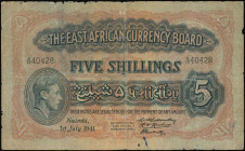 EAST AFRICA: 5 Shillings (1.7.1941) in blue-black on brown unpt. Portrait of King George VI at left on face. S/N: "B/20 40428". Three signatures. Prin...