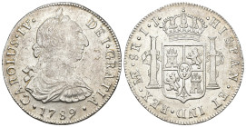CARLOS IV. 8 reales. 1789. Lima. IJ. AR 26,75 g. 40,72 mm. VI-750. Rayas y hojitas en rev. MBC+.