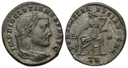 IMPERIO ROMANO. DIOCLECIANO. Follis. Treveris (298-299). A/ Cabeza laureada a der.; IMP DIOCLETIANVS P F AVG. R/ Fortuna sentada a izq. con timón y co...