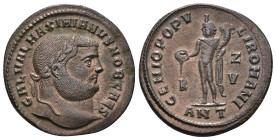 IMPERIO ROMANO. GALERIO. Follis. Antioquía (300-301). A/ Cabeza laureada a der.; GAL VAL MAXIMIANVS NOB CAES. R/ Genio a izq. con pátera y cornucopia;...