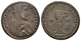 IMPERIO ROMANO. MAXIMINO II. Follis. Antioquía (310). A/ El césar de medio cuerpo a der. laureado y con vestidura imperial; MAXIMINVS NOB CAES. R/ El ...