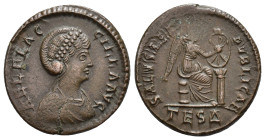 IMPERIO ROMANO. ELIA FLACILA. Follis. Tesalónica (383-388). A/ Busto diademado y drapeado a der.; AEL FLAC-CILLA AVG. R/ Victoria sentada a der. inscr...