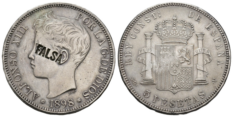 ALFONSO XIII. 5 pesetas. 1898*18-98. Madrid. SGV. Resello FALSA. 25,58 g. 37,3 m...