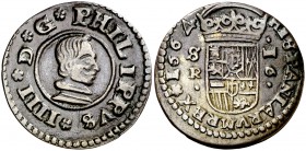 1664. Felipe IV. Sevilla. R. 16 maravedís. (Cal. 1570). 4 g. Buen ejemplar. Ex Áureo 26/09/2007, nº 727. MBC+.