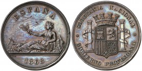 1868. Gobierno Provisional. Medalla en bronce que sirvió de prueba para el duro de 1869. (V.Q. 14374). 24,95 g. Rayitas y golpecitos. (MBC+).