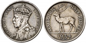 1934. Isla Mauricio. Jorge V. 1/2 rupia. (Kr. 16). 5,83 g. AG. Golpecito. Escasa. EBC-.