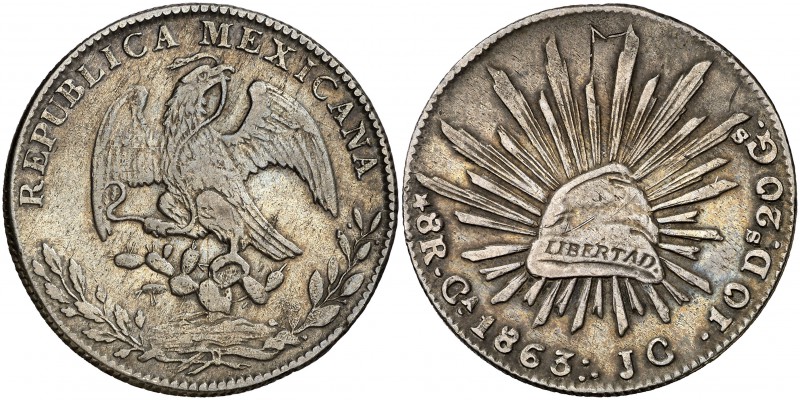 1863. México. Ca (Chihuahua). JC. 8 reales. (Kr. 377.2). 26,64 g. AG. Rayitas. M...
