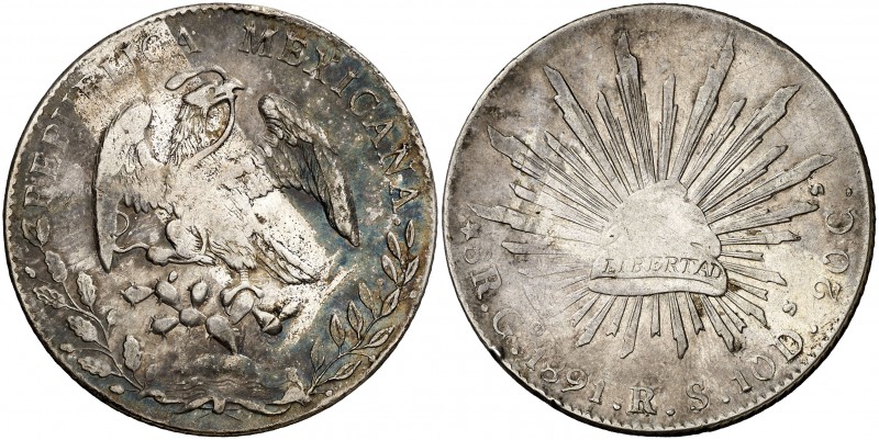 1891. México. Go (Guanajuato). RS. 8 reales. (Kr. 377.8). 26,97 g. AG. Golpecito...