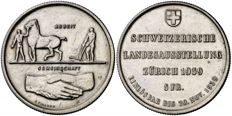 1939. Suiza. Huguenin. Le Locle. 5 francos. (Kr. 43). 19,42 g. AG. Exposición en...