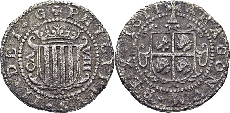 FELIPE III. 8 reales. Zaragoza. 1611. Punto, muy débil, entre las barras. Escudo...