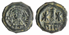 Maurice Tiberius (582-602). Æ 10 Nummi (14mm, 1.56g, 6h). Nicomedia. Crowned, draped and cuirassed bust facing. R/ Large I; stars flanking; NIKO. MIBE...