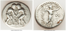 PISIDIA. Selge. Ca. 325-250 BC. AR stater (21mm, 11.19 gm, 12h). VF. Two wrestlers grappling, K between / ΣΕΛΓΕΩΝ, slinger striding to right, pulling ...