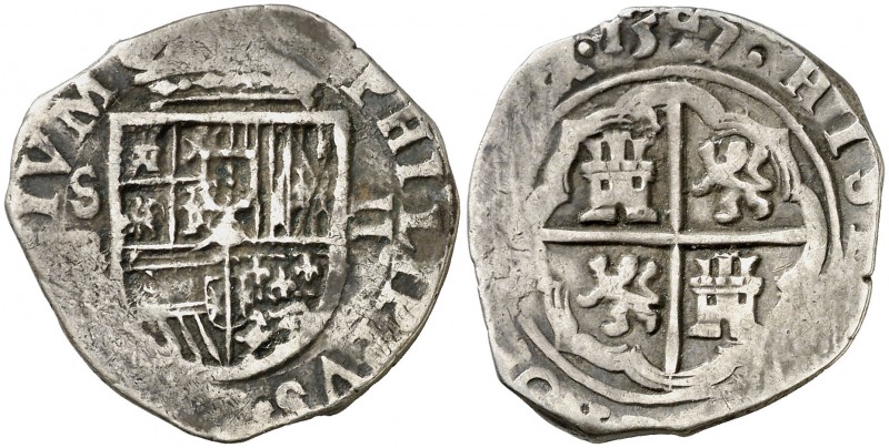 1597. Felipe II. Sevilla. B. 2 reales. (Cal. 551). 6,80 g. Tipo "OMNIVM". Fecha ...