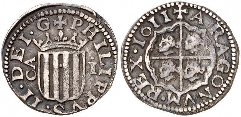 1611. Felipe III. Zaragoza. 1 real. (Cal. 524). 3,42 g. Pátina oscura. Escasa. M...