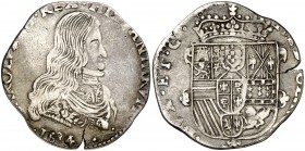 1694. Carlos II. Milán. 1/2 felipe. (Vti. 17) (MIR. 388/2) (Crippa 8). 13,55 g. Bajo busto maduro: (marca de ensayador). Rara. MBC.