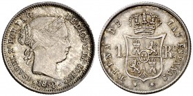 1859. Isabel II. Sevilla. 1 real. (Cal. 440). 1,28 g. Bella pátina. Rara. EBC.