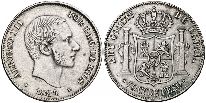 1884. Alfonso XII. Manila. 50 centavos. (Cal. 84). 12,98 g. Limpiada. Escasa. MB...