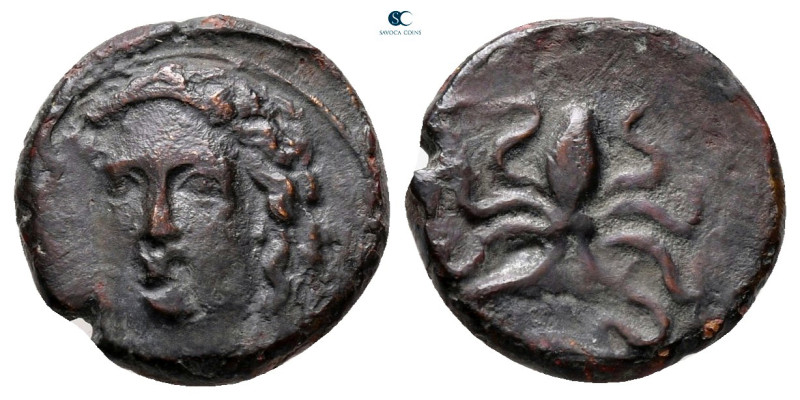 Sicily. Syracuse. Dionysios I 405-367 BC. 
Tetras Æ

13 mm, 1,80 g

Facing ...