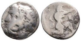 THRACE. Thasos. Drachm (Circa 404-355 BC).
Obv: Head of Dionysos left, wearing ivy wreath.
Rev: ΘΑΣ / Ι / OΝ.
Herakles kneeling right, drawing bow; al...
