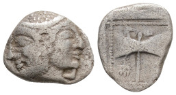 TROAS. Tenedos. Hemidrachm (Circa 500-470 BC).
Obv: Archaic janiform head, male on left, female on right.
Rev: T-E / N-E.
Double axe within incuse squ...