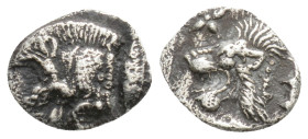 MYSIA. Kyzikos. Hemiobol (Circa 450-400 BC).
Obv: Forepart of boar left; to right, tunny upward.
Rev: Head of roaring lion left; star to upper left; a...