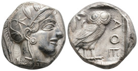 Attica, Athens AR Tetradrachm. Circa 454-404 BC. Head of Athena right, wearing earring, necklace, and crested 
Attic helmet decorated with three olive...