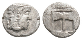Islands of Troas, Tenedos, c. 450-387 BC. AR Obol Janiform female and male heads. R/ Labrys 
 (double axe) within shallow incuse square.
0.5g 8.3mm
