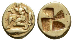Mysia, Kyzikos EL Hekte. Circa 500-450 BC. Nude hero, wearing crested Corinthian helmet, kneeling to left on tunny fish, 
holding trumpet to mouth wit...