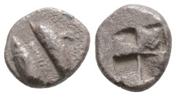 Mysia, Kyzikos AR Obol. c. 525-475. Dolphin l. above tunny / Four-part incuse square.
0.9g 10mm