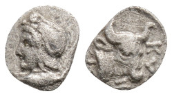 Mysia, Kyzikos AR Hemiobol. c. 410-400. Head of Attis l., wearing Phrygian cap; tunny below / Bull’s head .
0.3g 7.2mm