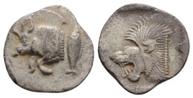 Mysia, Kyzikos AR Obol (?). 525-475 BC. Forepart of boar left, tunny fish behind / Head of roaring lion left, within incuse square.
0.7g 12.4mm