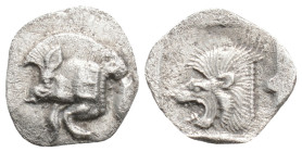 Mysia, Kyzikos AR Obol. c. 450-400. Forepart of boar l., E (retrograde) on shoulder, tunny behind / Head of lion l. within incuse square.
0.7g 12.9mm
