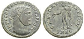 Maximinus II Æ Nummus. Nicomedia, AD 308-310. IMP C GAL VAL MAXIMINVS P F AVG, laureate head right / GENIO AVGVSTI CMH (ligate), Genius standing left,...