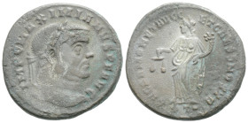 Maximianus Æ Nummus. Rome, AD 300-301. IMP C MAXIMIANVS PF AVG, Laureate head right / SACRA MONVRB AVGG ET CAESS NN, Moneta standing left, holding sca...