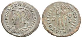 Constantine I Æ Nummus. Londinium, AD 310-314. CONSTANTINVS AVG, helmeted and cuirassed bust left, with spear over shoulder and shield / SOLI INVICTO ...