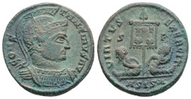 Constantine I Æ Follis. Siscia, AD 320. Helmeted and cuirassed bust right / Two captives seated at base of banner inscribed VOT X in two lines; S-F ac...