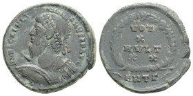 Julian II Æ3. Heraclea, 361-363. Helmeted, pearl-diademed and cuirassed bust l., holding spear and shield / VOT/X/MV•LT/XX in four lines within wreath...